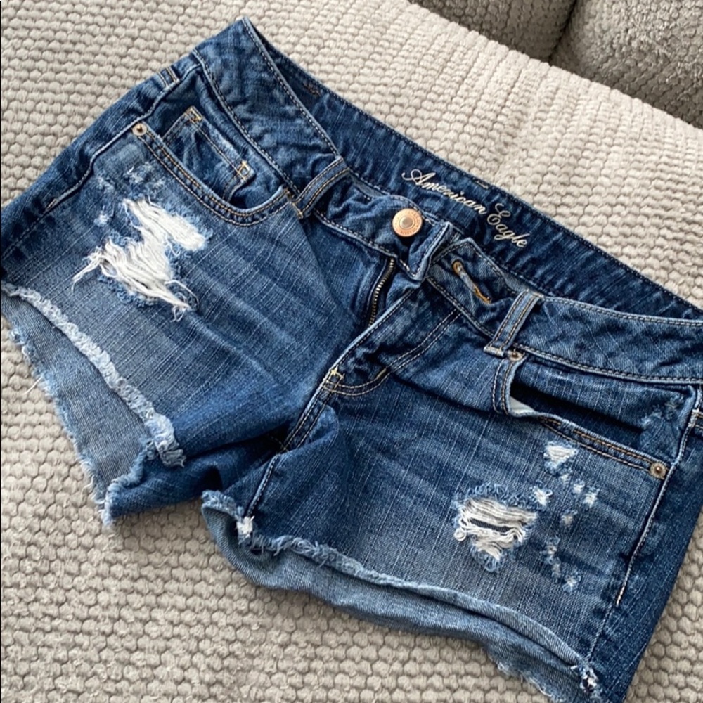Blue ripped jean shorts